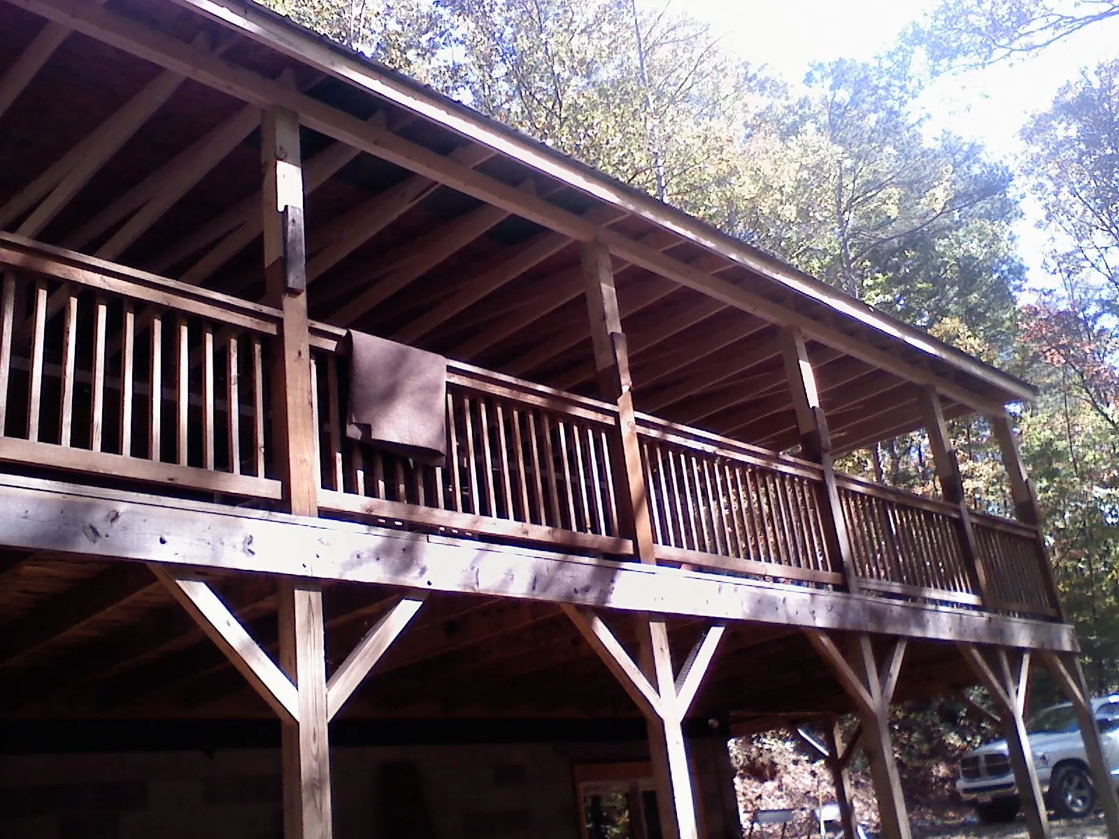 Timber framing under a new elevated porch and deck — Roof Leak Repair in Calypso by Roofing Brothers